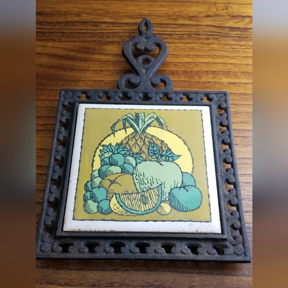 Holt Howard vintage cast iron trivit with fruit design tile